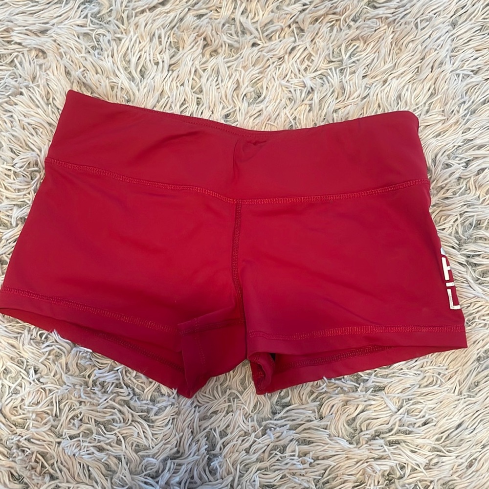 Red FITADE lifting shorts. Size medium.